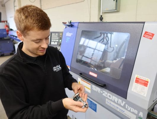 CNC sliding head machining companies UK